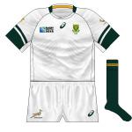 South Africa (alt): Followed the same stylings as the normal strip, in white with green trim. Worn against Scotland but when South Africa played the US, who also play in navy, both countries were in dark shirts.